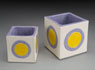 Square prism vases stoneware with earthenware glaze: sun yellow (IC), orchid (OC). SPV 1-4, 9x9x9 cm $55; SPV 2-4, 11x11x11 cm $70